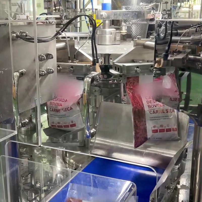 अनुकूलित कुशल निर्जलित गोमांस नगेट्स मात्रात्मक बैगिंग पैकेजिंग मशीन खाने के लिए तैयार खाद्य गोमांस बहुमुख्य वेजर